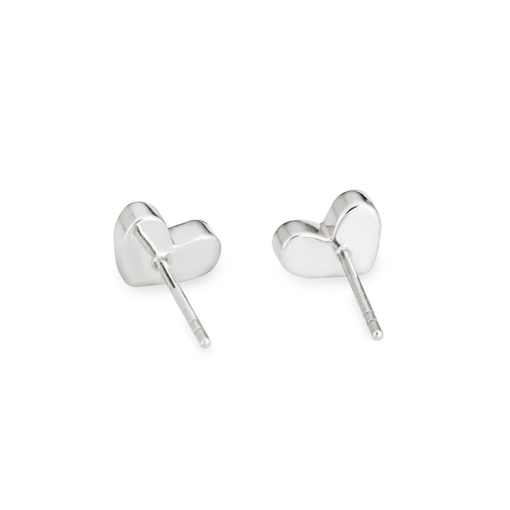 Signature heart stud cremation earrings in 14k white gold shown from the back