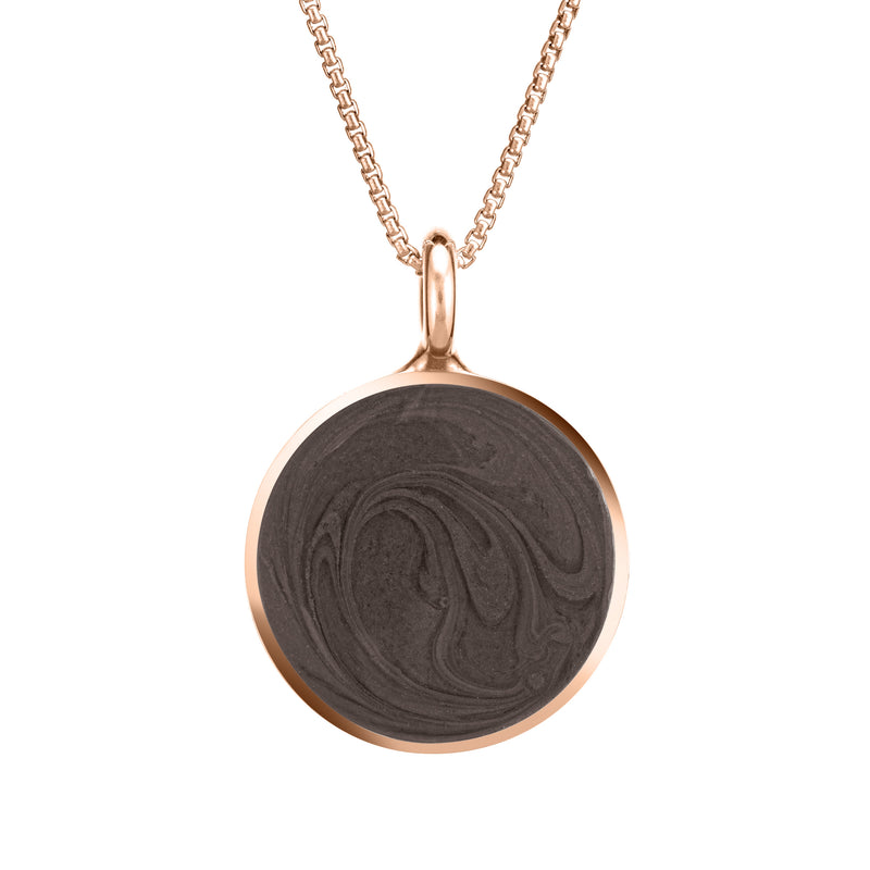 The 14k rose gold simple bail circle pendant by close by me jewelry from the front