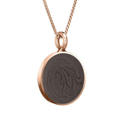 The 14k rose gold simple bail circle pendant by close by me jewelry from the side