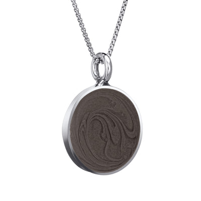 The sterling silver simple bail circle memorial necklace by close by me jewelry from the side