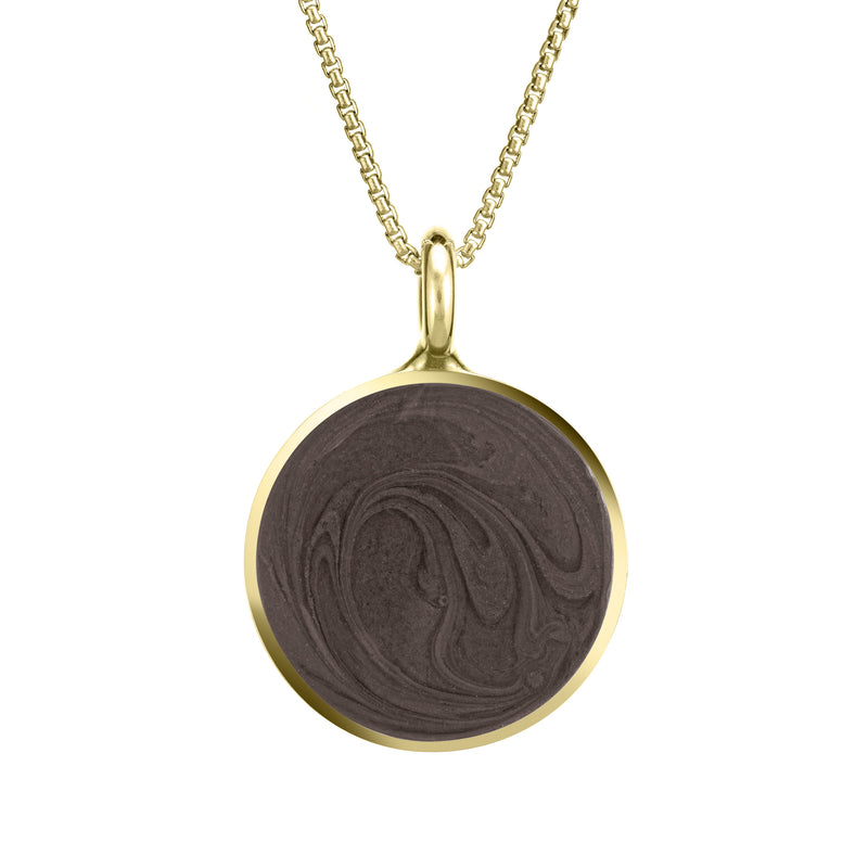 The 14k yellow gold simple bail circle ashes pendant by close by me jewelry from the front