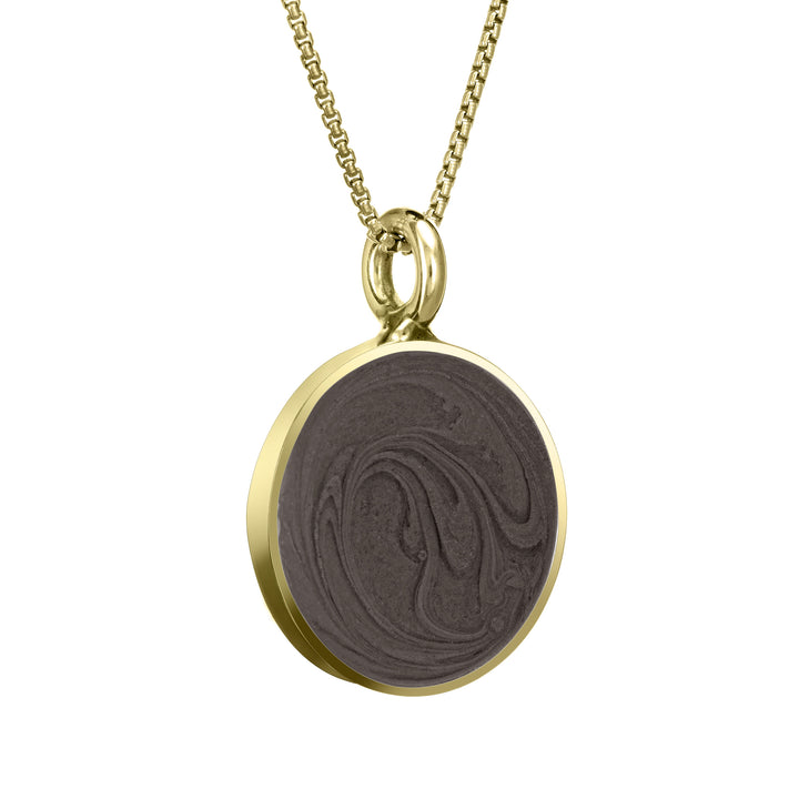 The 14k yellow gold simple bail circle ashes pendant by close by me jewelry from the side