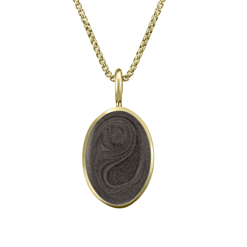 The simple bail oval necklace with ashes by close by me jewelry in 14k yellow gold from the front