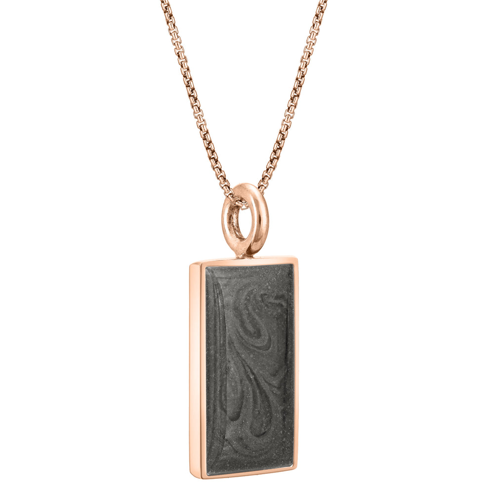 The 14k rose gold simple bail rectangle memorial pendant by close by me jewelry from an angle