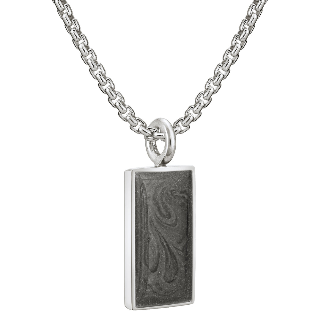 The sterling silver simple bail rectangle pendant with cremated remains on a thick chain by close by me jewelry from an angle