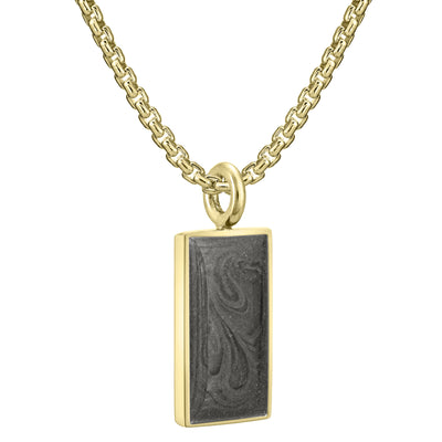 The 14k yellow gold simple bail rectangle cremains pendant on a thick chain by close by me jewelry from an angle