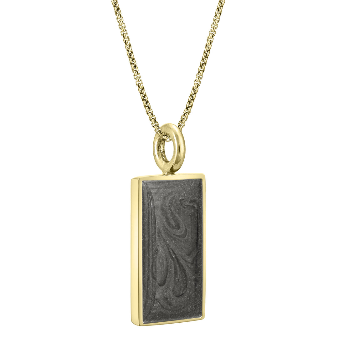 The 14k yellow gold simple bail rectangle cremated remains pendant on a thin chain by close by me jewelry from an angle