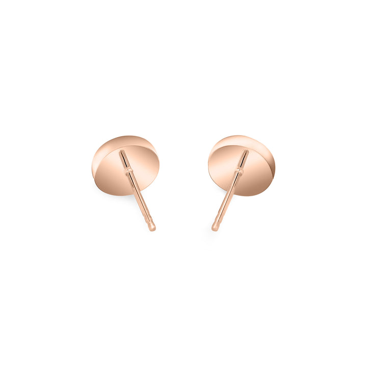 close by me's 14k rose gold circular stud earrings with ashes from the back