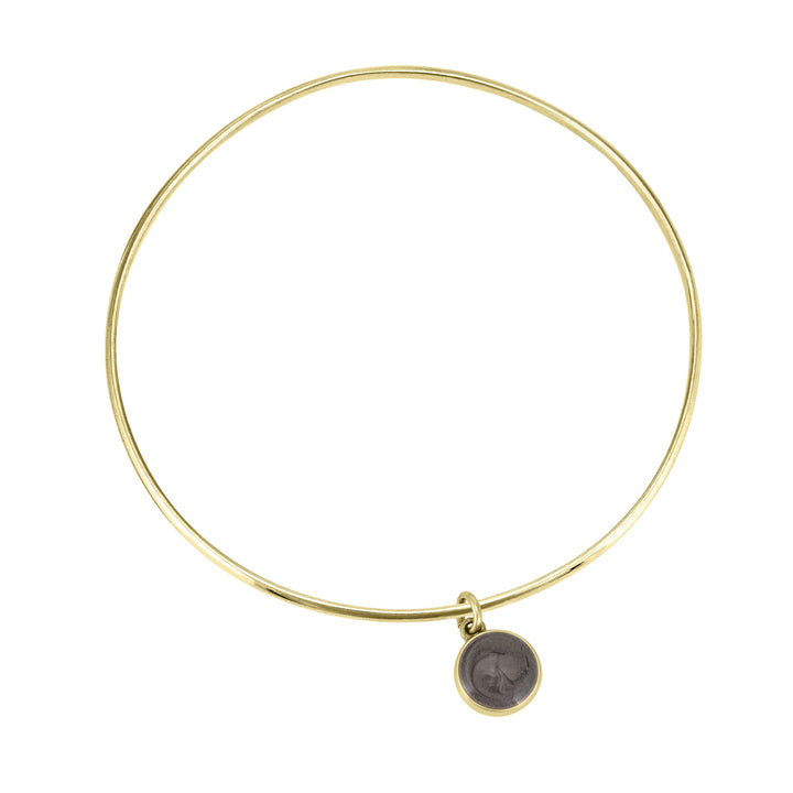single bangle cremation bracelet in 14k yellow gold with 8mm dome charm shown from the top