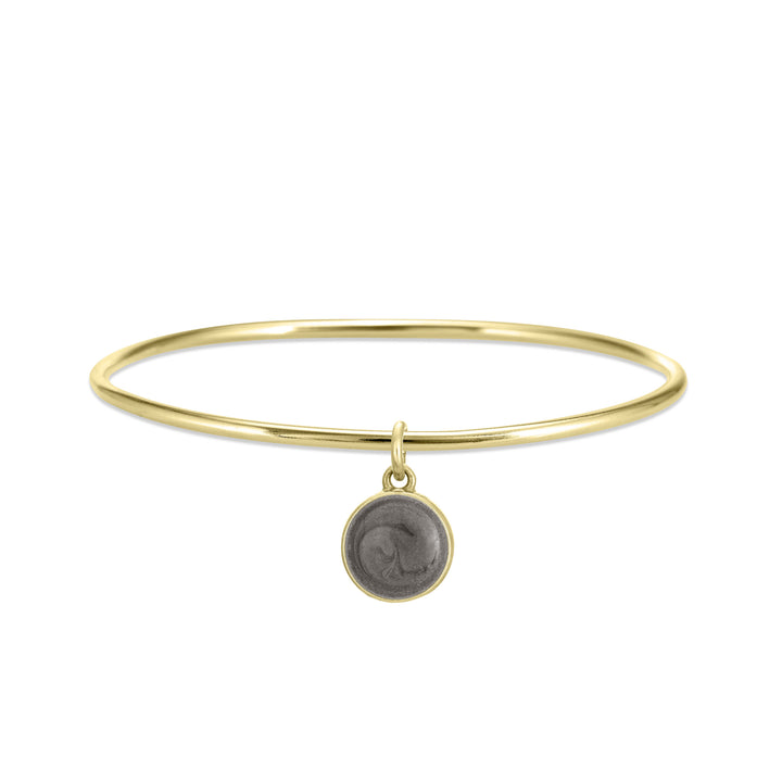 single bangle cremation bracelet in 14k yellow gold with 8mm dome charm shown from the front
