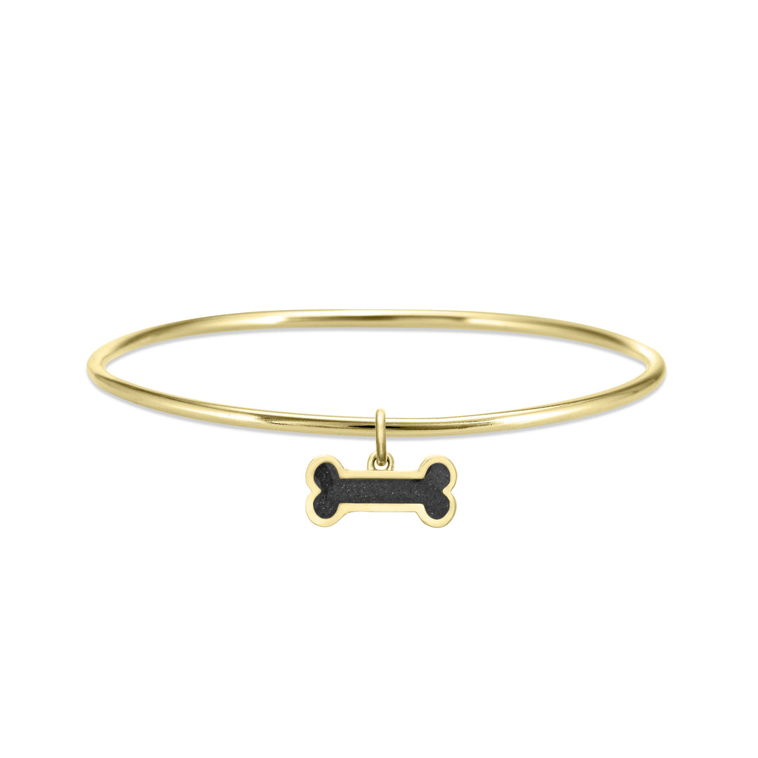single bangle cremation bracelet in 14k yellow gold with dog bone charm shown from the front