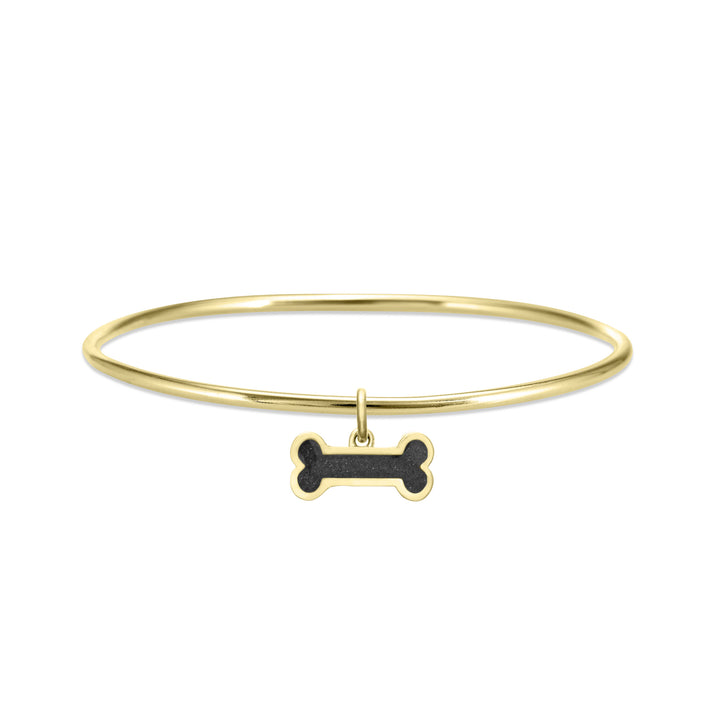 single bangle cremation bracelet in 14k yellow gold with dog bone charm shown from the front