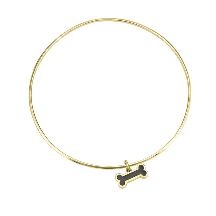 single bangle cremation bracelet in 14k yellow gold with dog bone charm shown from the top