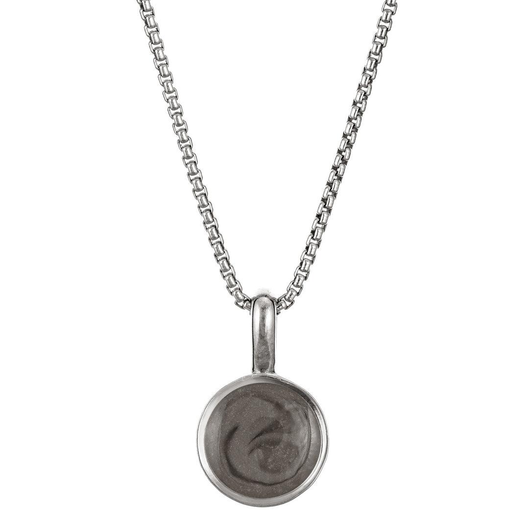 The Sterling Silver Single Setting Circle Ashes Necklace designed and set with cremains by close by me jewelry from the front