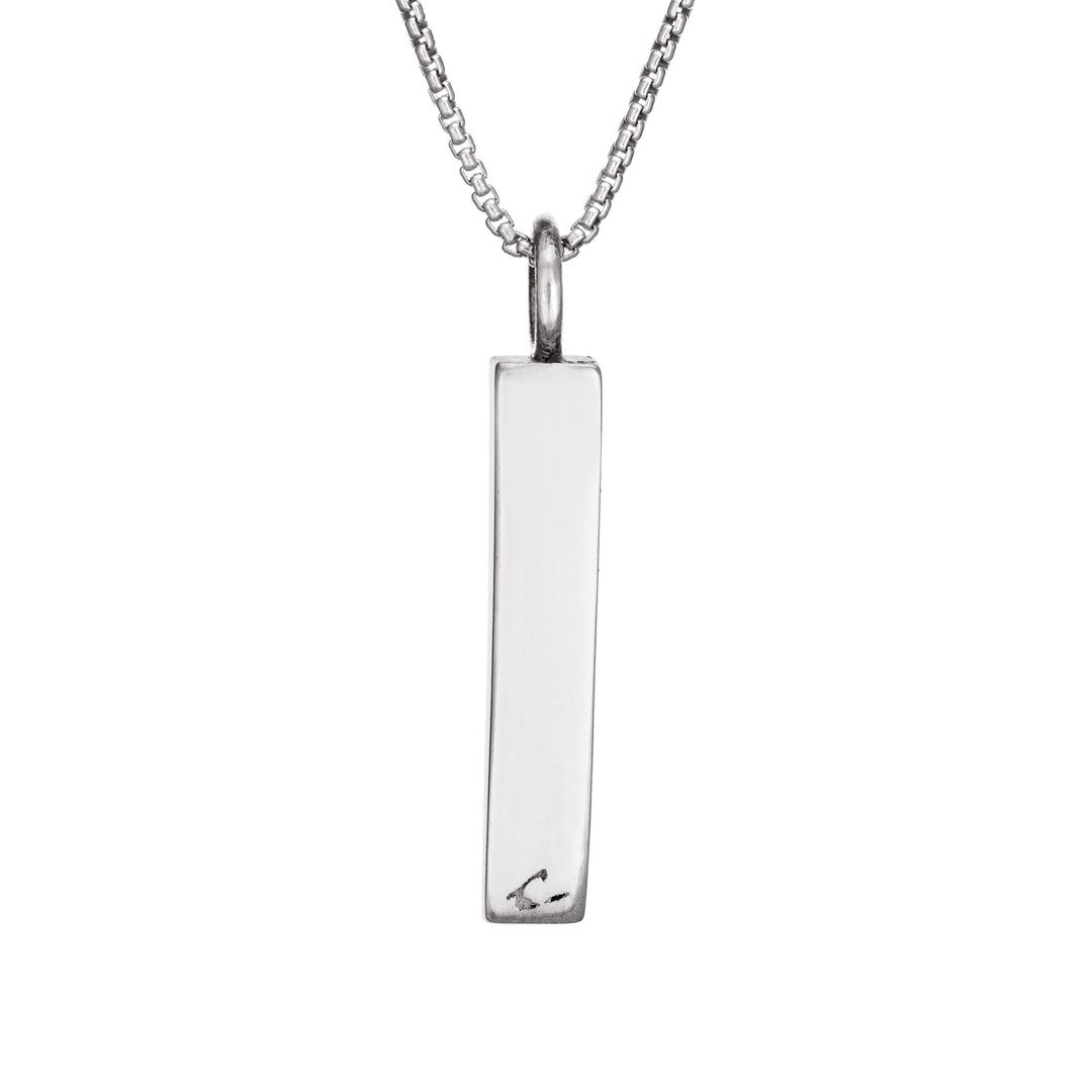 close by me jewelry's sterling silver small bar memorial pendant from the back