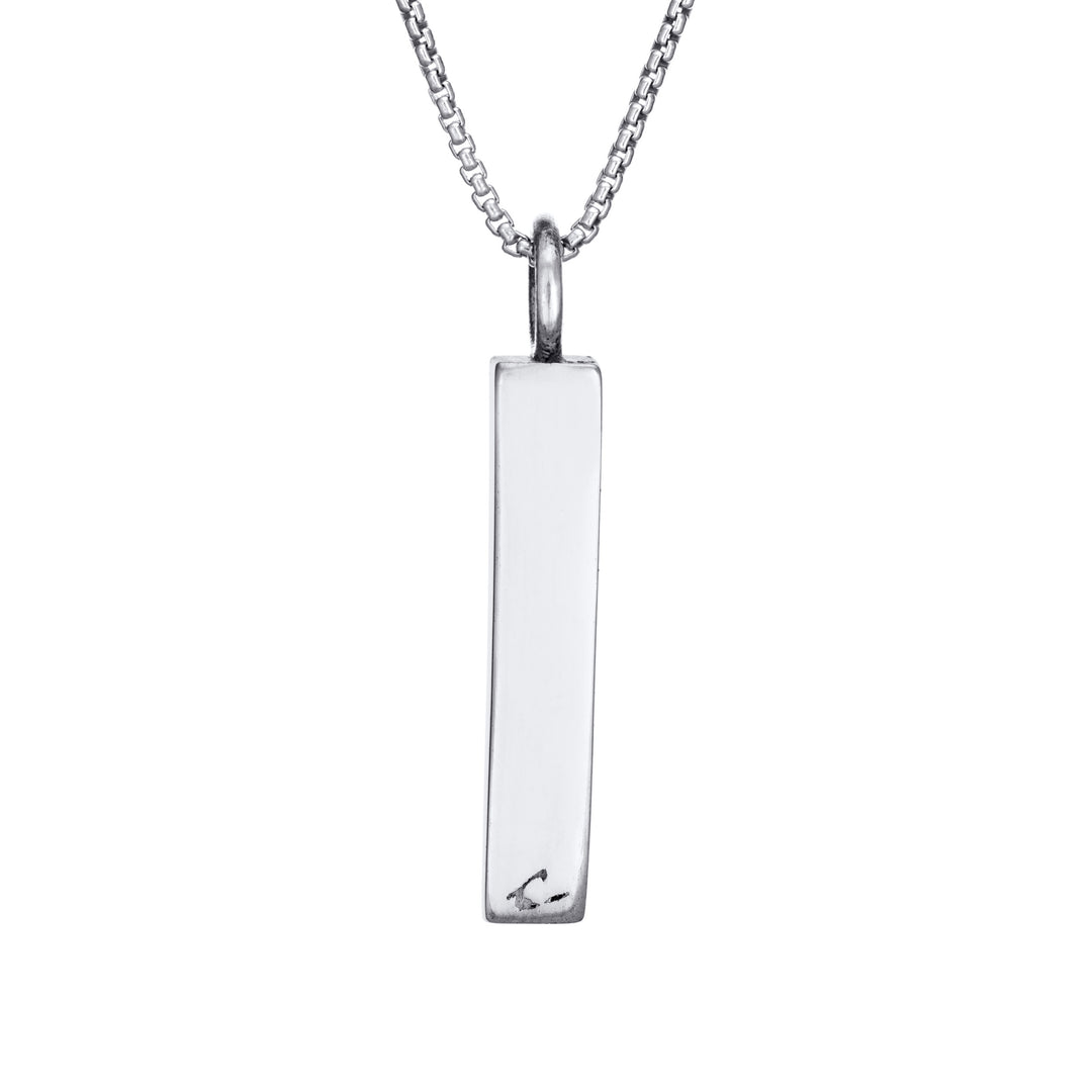 close by me jewelry's 14k white gold small bar ashes pendant from the back