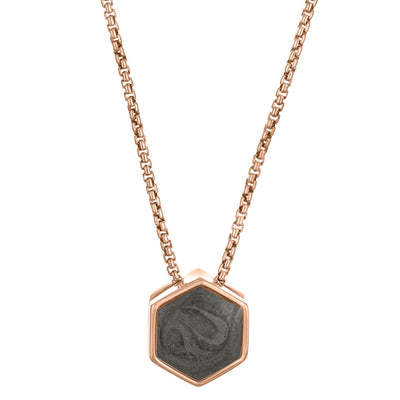 This photo shows the Small Hexagon Sliding Cremation Necklace designed by close by me jewelry in 14K Rose Gold from the front