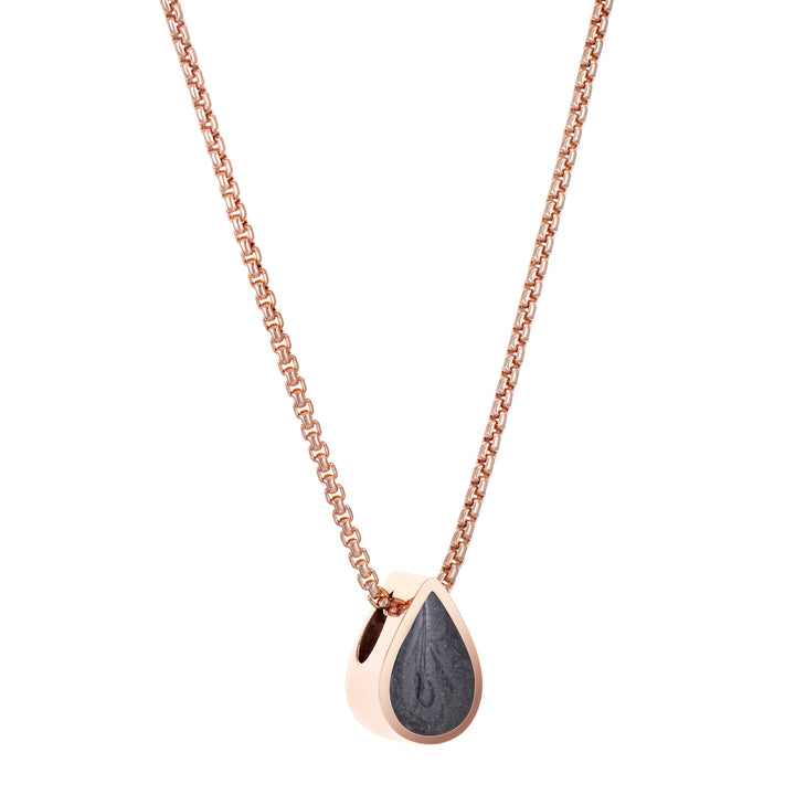 This photo shows the 14K Rose Gold Small Pear Sliding Cremation Pendant designed by close by me jewelry from the side