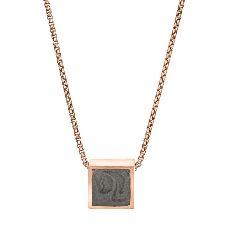 Pictured here is the 14K Rose Gold Small Square Sliding Ashes Pendant designed by close by me jewelry from the front