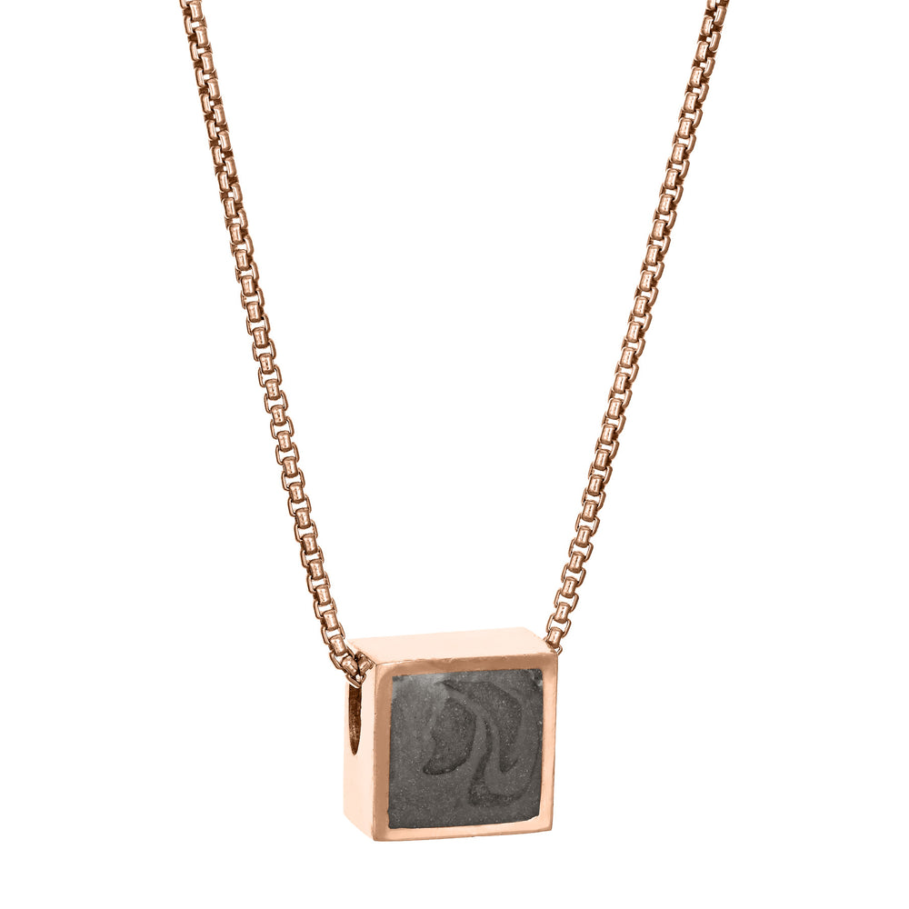 Pictured here is the 14K Rose Gold Small Square Sliding Ashes Pendant designed by close by me jewelry from the side