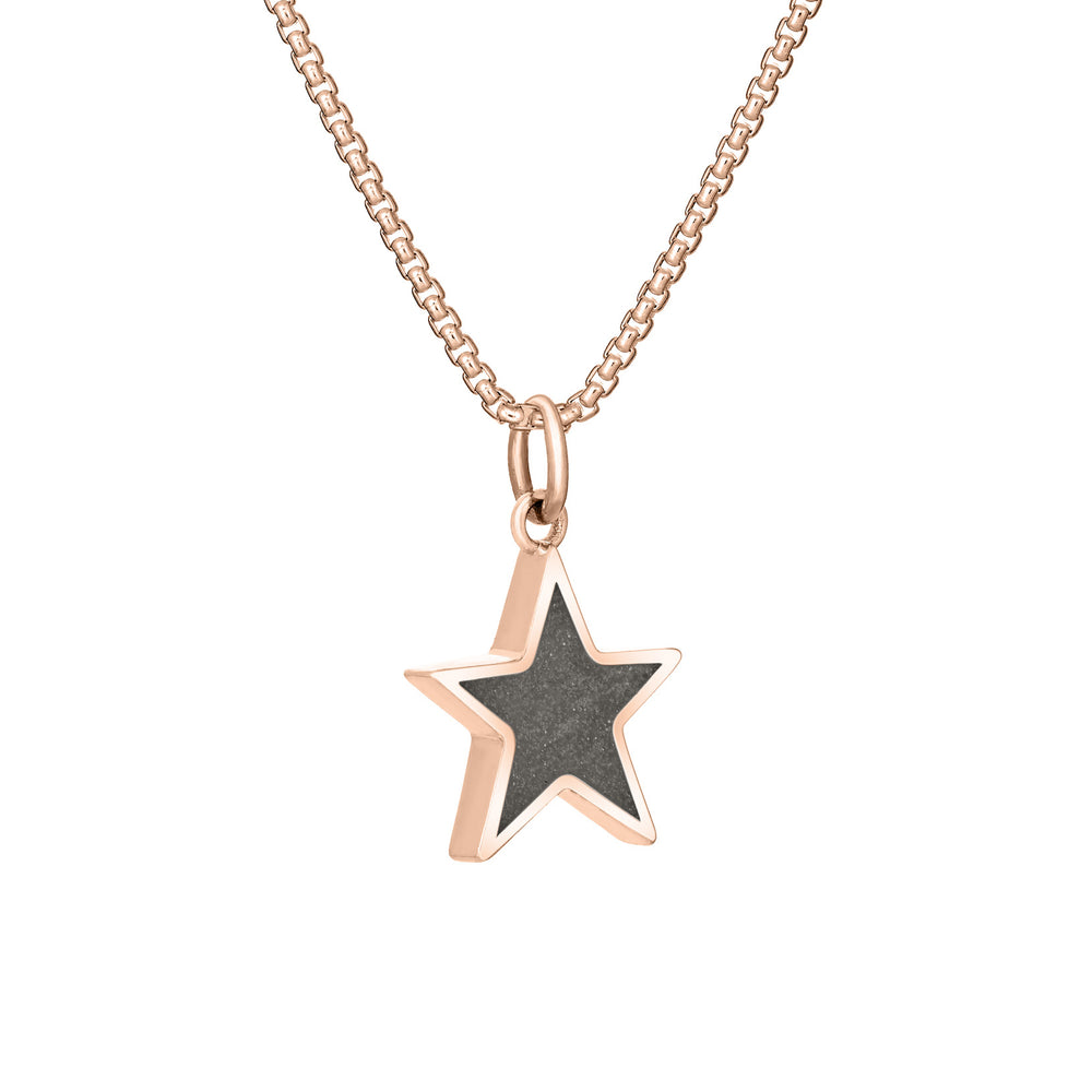 Side of Star Cremation Pendant in 14K Rose Gold on a chain against a white background.