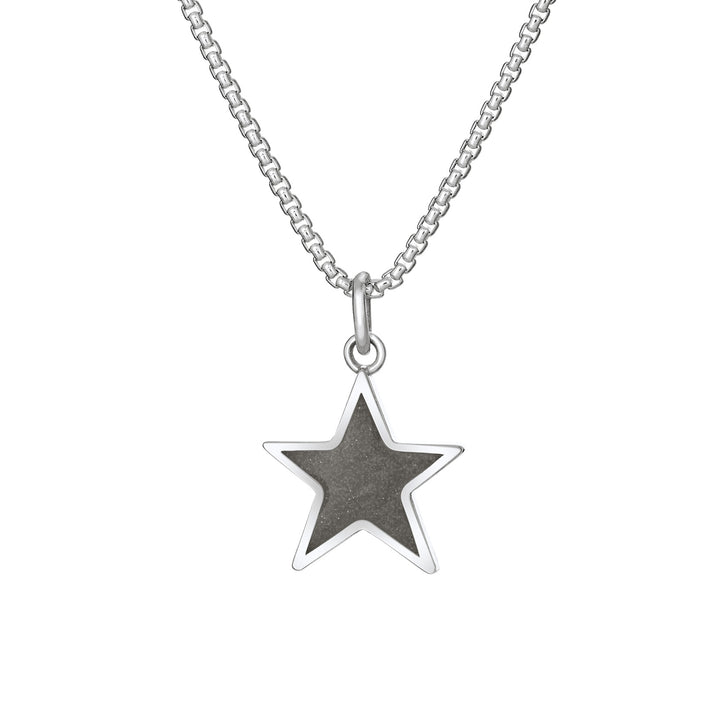 Front of Star Cremation Pendant in Sterling Silver on a chain against a white background.
