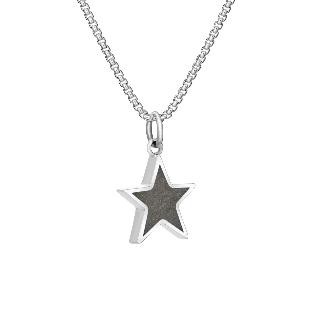 Side of Star Cremation Pendant in Sterling Silver on a chain against a white background.