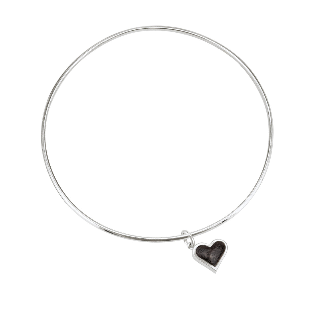 Sterling silver single bangle cremation bracelet with heart ashes charm shown from the top