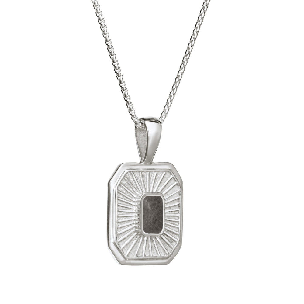 Close-up side view of Close By Me's Tessa Cremation Pendant in Sterling Silver, set against a solid white background.