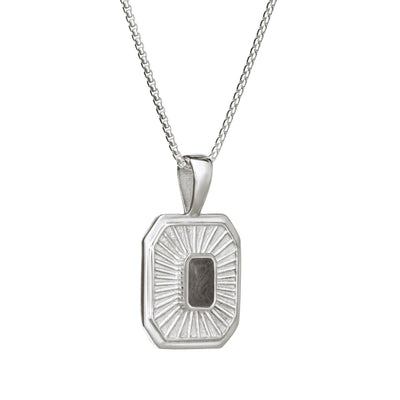 Close-up side view of Close By Me's Tessa Cremation Pendant in Sterling Silver, set against a solid white background.