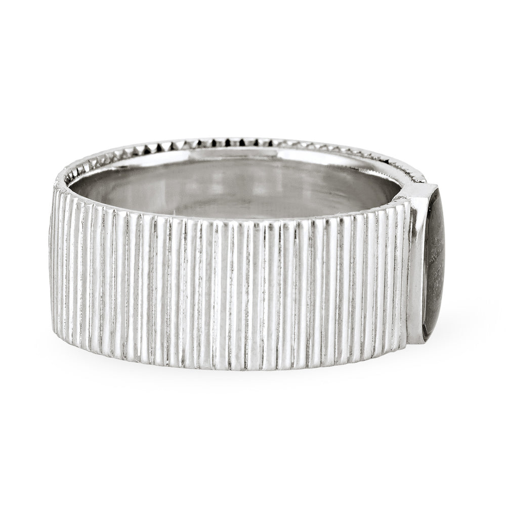 Close-up, side view of Close By Me's Tessa Cremation Ring in Sterling Silver, set against a solid white background.