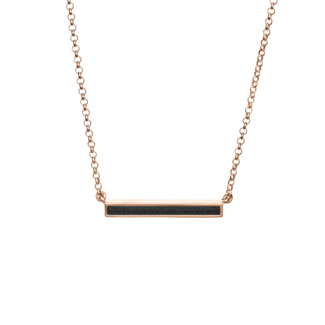 A front facing photo of the 14k rose gold thin lateral bar ashes necklace designed with cremated remains by close by me