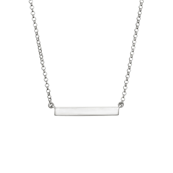 The back of the sterling silver ashes thin lateral bar pendant with an attached chain designed and set by close by me