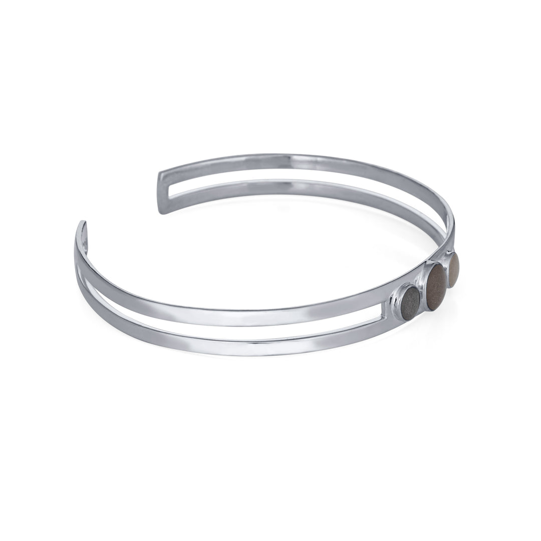 Three setting cremation cuff bracelet in 14k white gold shown from the side