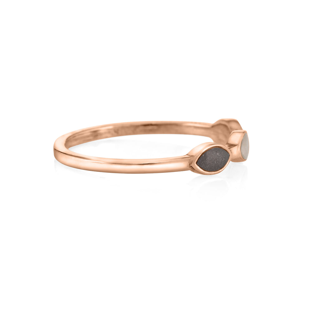 side view of close by me's 14k rose gold cremation ring with three marquise-shaped ash settings