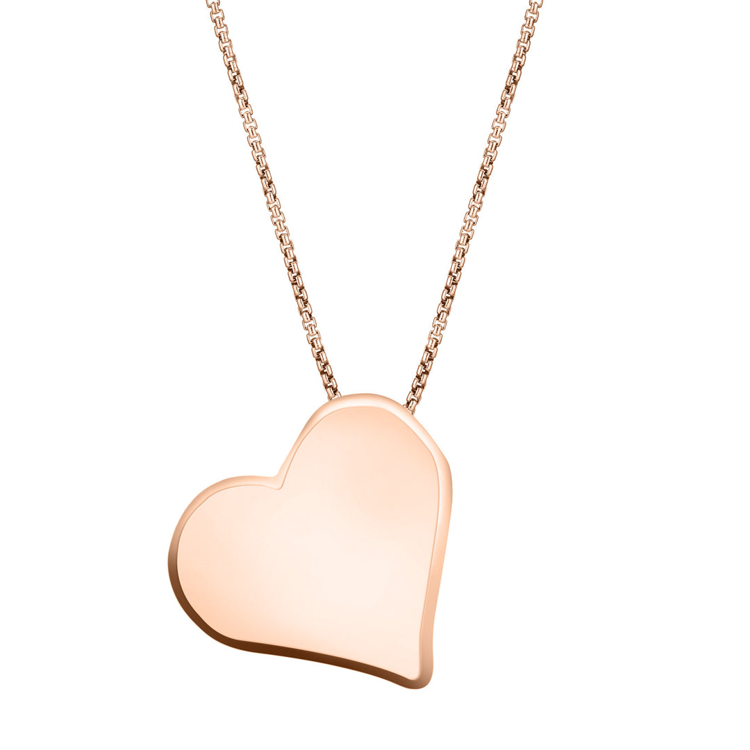 The 14K Rose Gold Heart Shaped Pendant with ashes, designed by close by me with a hidden bail to make the piece tilt, from the back