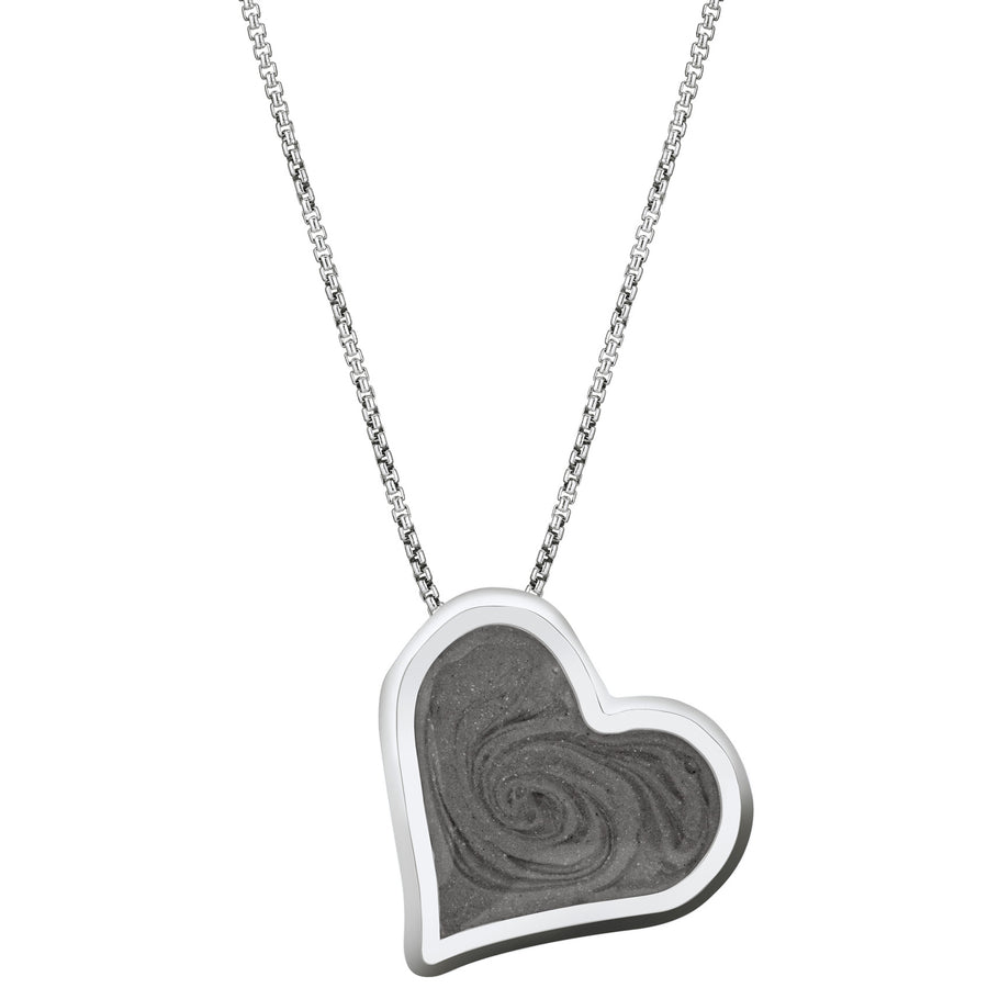 The Sterling Silver Heart Ashes Pendant, designed by close by me with a hidden bail to make the piece tilt, from the front