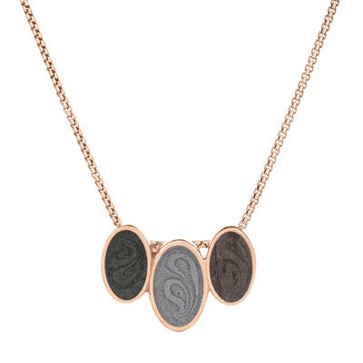 The 14K Rose Gold Triple Oval Ashes Pendant by close by me jewelry from the front