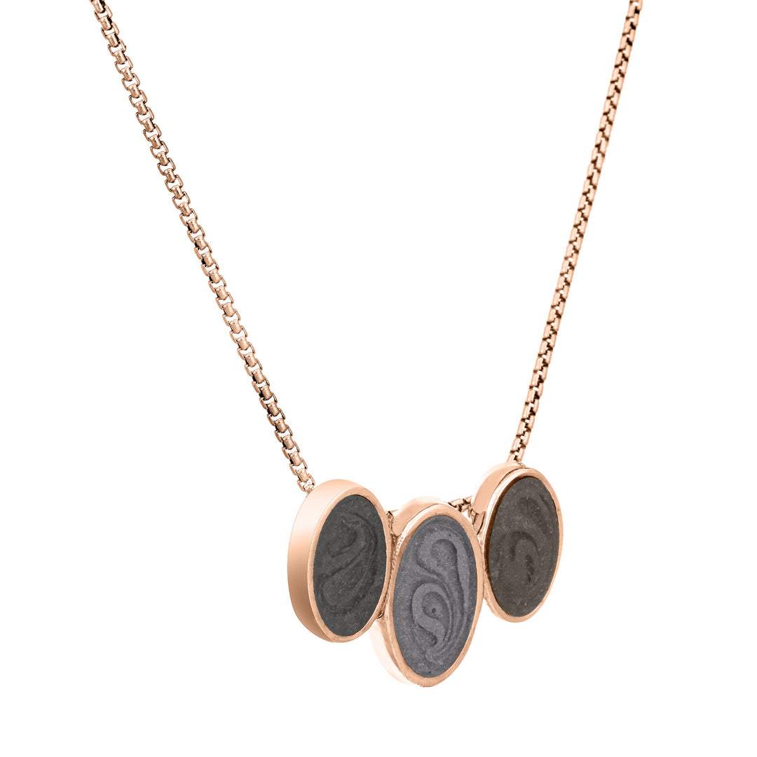 The 14K Rose Gold Triple Oval Ashes Pendant by close by me jewelry from the side