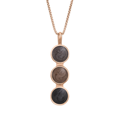 The Triple Setting Circle Memorial Necklace designed and set with three sets of ashes in 14K Rose Gold by close by me jewelry from the front