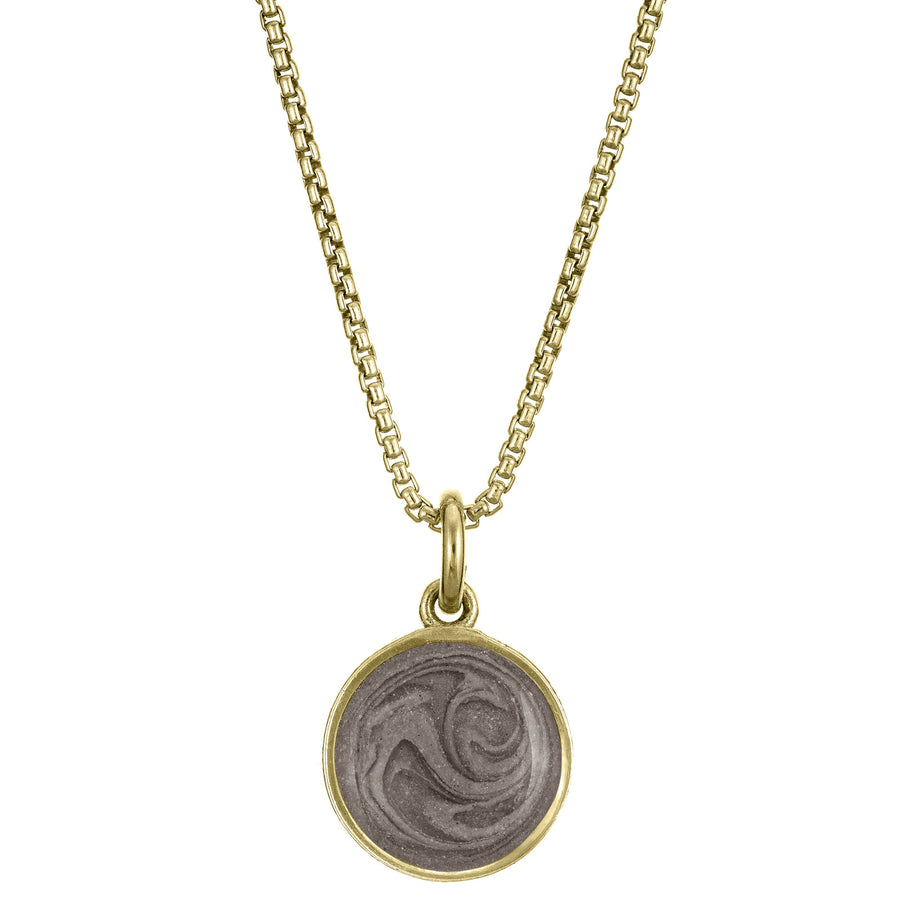Pictured here is the 10mm Dome Pendant with ashes, designed by close by me jewelry in 14K Yellow Gold, from the front