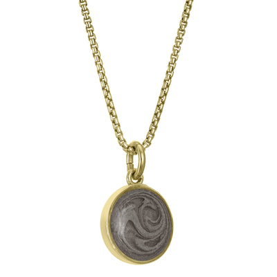 Pictured here is the 10mm Dome Pendant with ashes, designed by close by me jewelry in 14K Yellow Gold, from the side