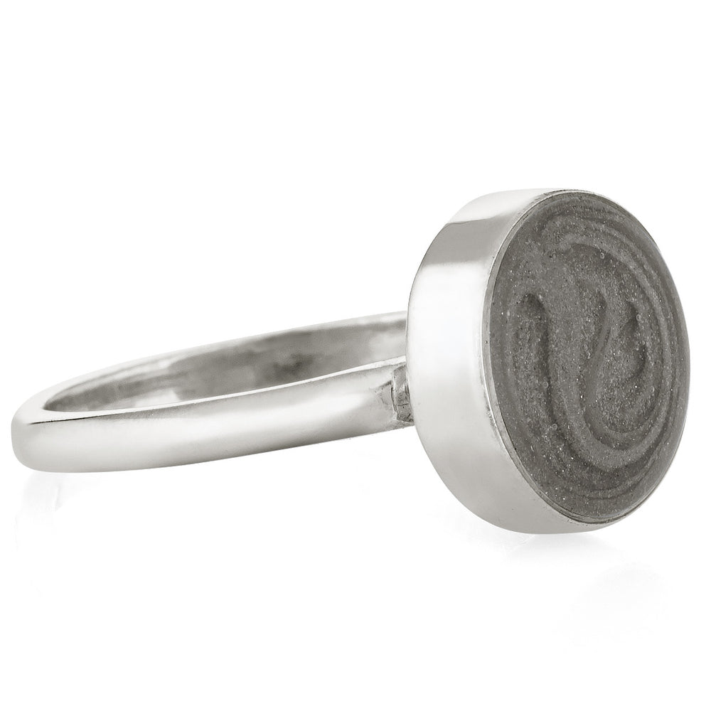 This photo shows the Sterling Silver 12mm Circle Cremains Stacking Ring designed by close by me jewelry from the side
