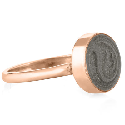 A photo showing the side view of close by me's 14K Rose Gold 12mm Circle Stacking Ring