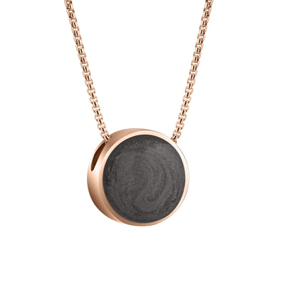 Pictured here is a side view of Close By Me's circular 12mm Sliding Solitaire Cremation Necklace in 14K Rose Gold.