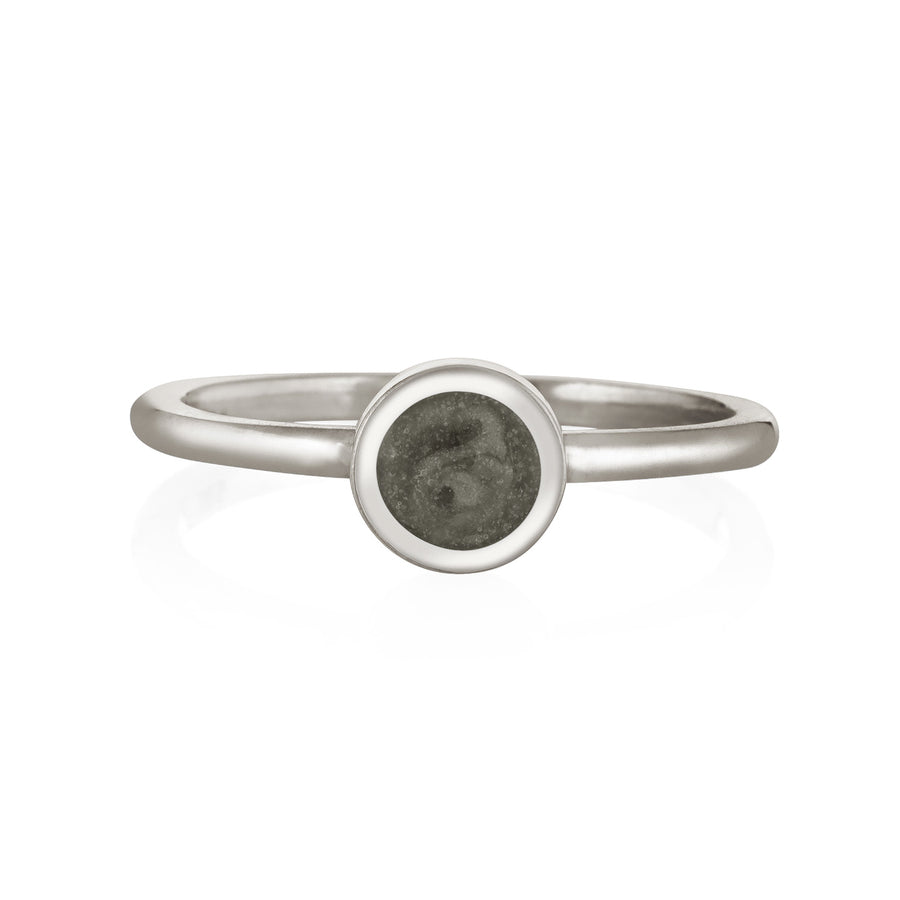 Pictured here is close by me jewelry's Sterling Silver Stacking Ring with a 5mm Ashes Setting from the front to show the grey cremains