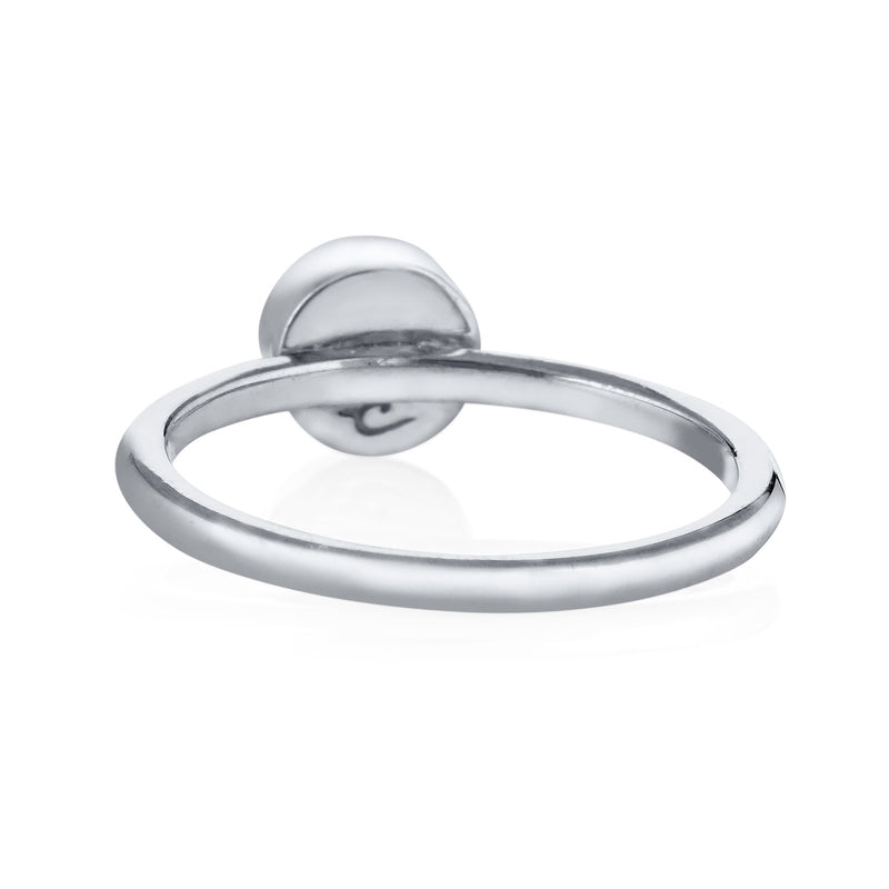Pictured here is the 14K White Gold 5mm Circle Stacking Cremation Ring by close by me jewelry from the back to show the back of the setting and inside of the band