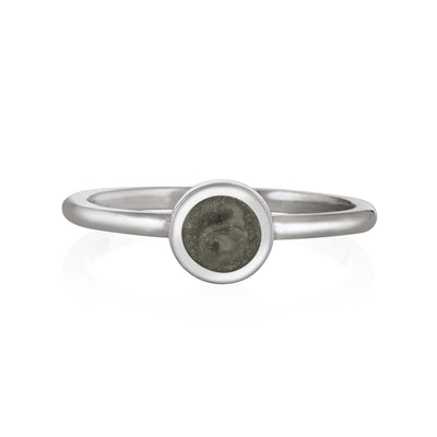 Pictured here is the 14K White Gold 5mm Circle Stacking Cremation Ring by close by me jewelry from the front to show its gray cremation setting