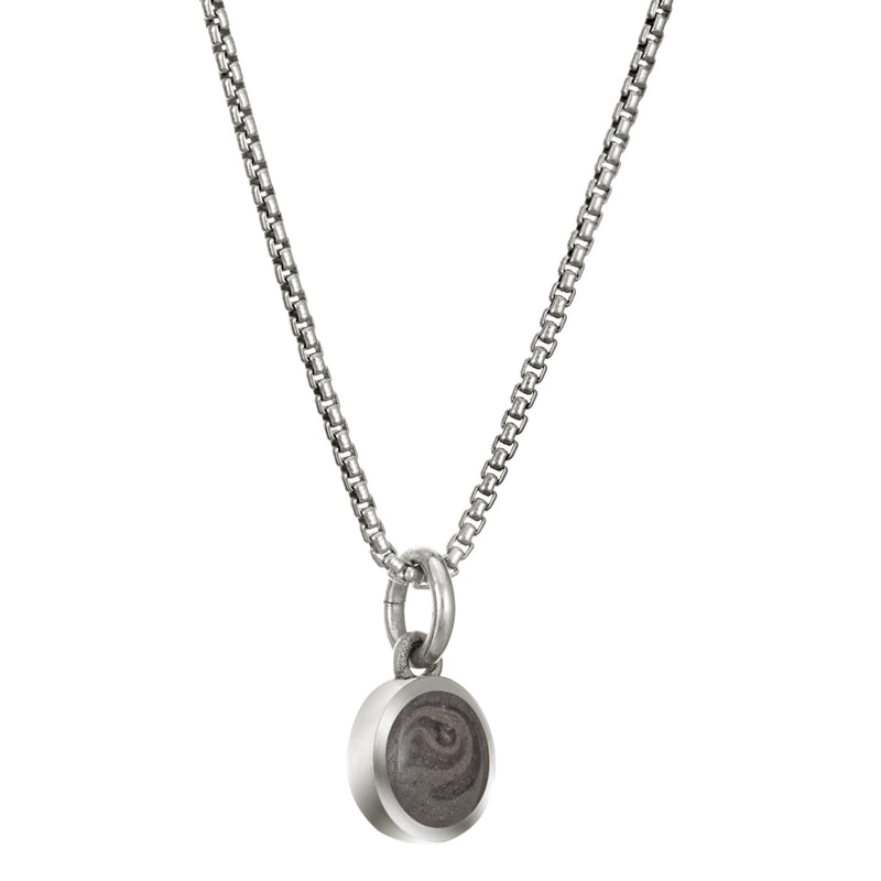 Pictured here is the Sterling Silver 6mm Dome Necklace with ashes designed by close by me jewelry from the side