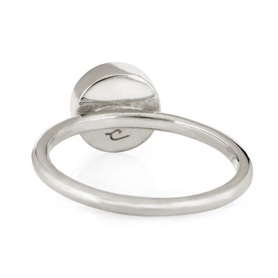 This photo shows the 8mm Circle Stacking Cremains Ring design by close by me jewelry in Sterling Silver from the back